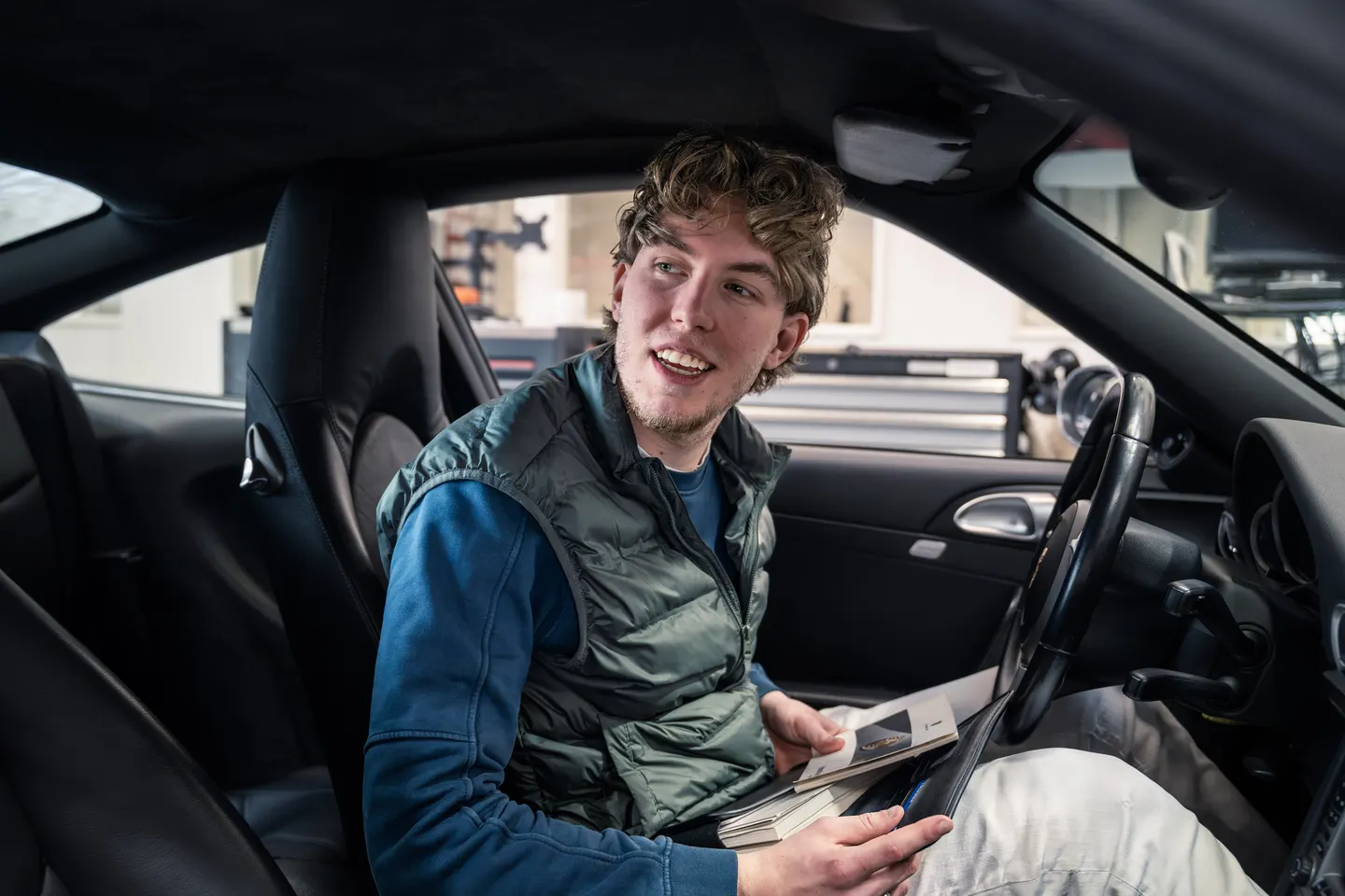 GTAX Repair team member inside a car