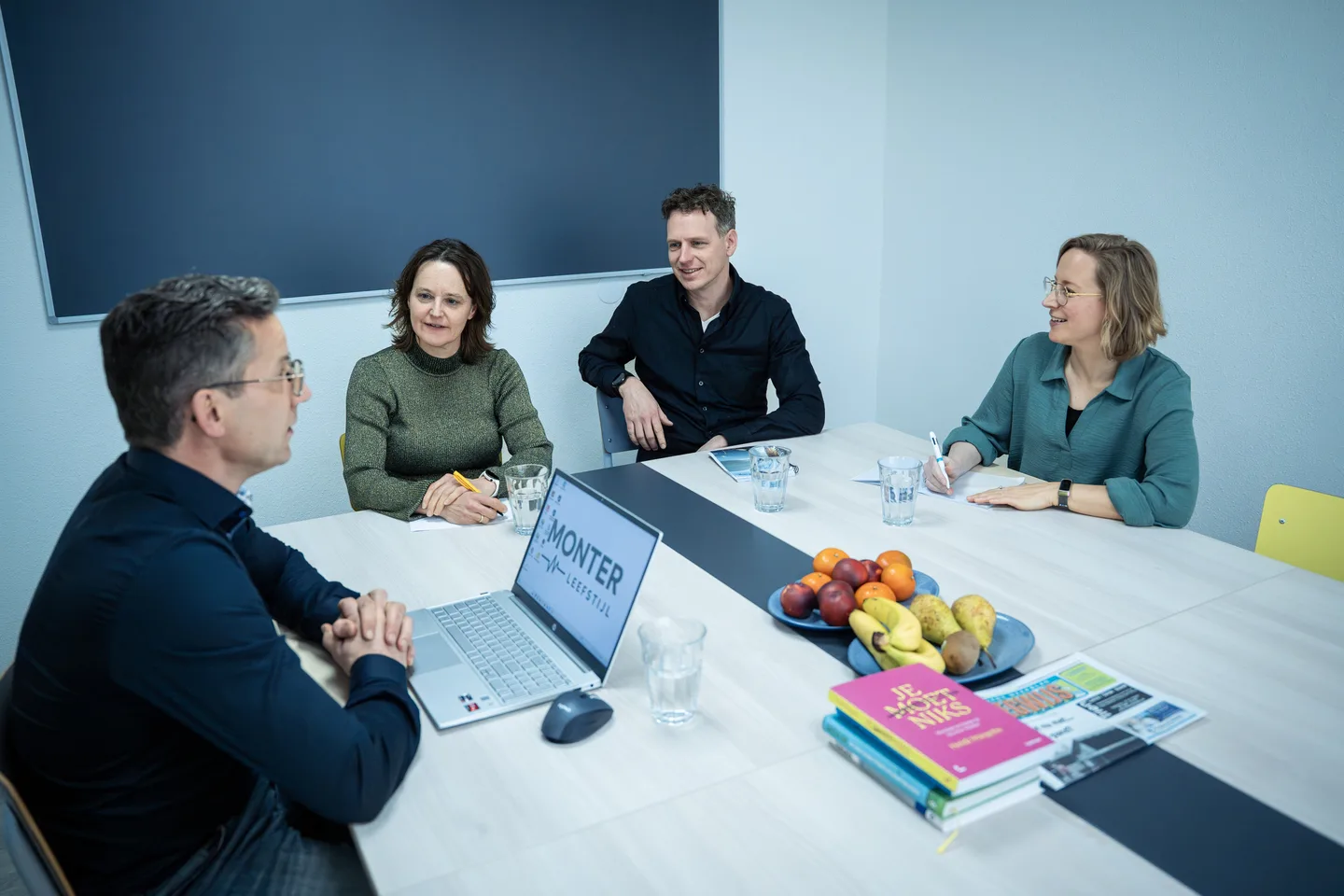 Team meeting around a worktable