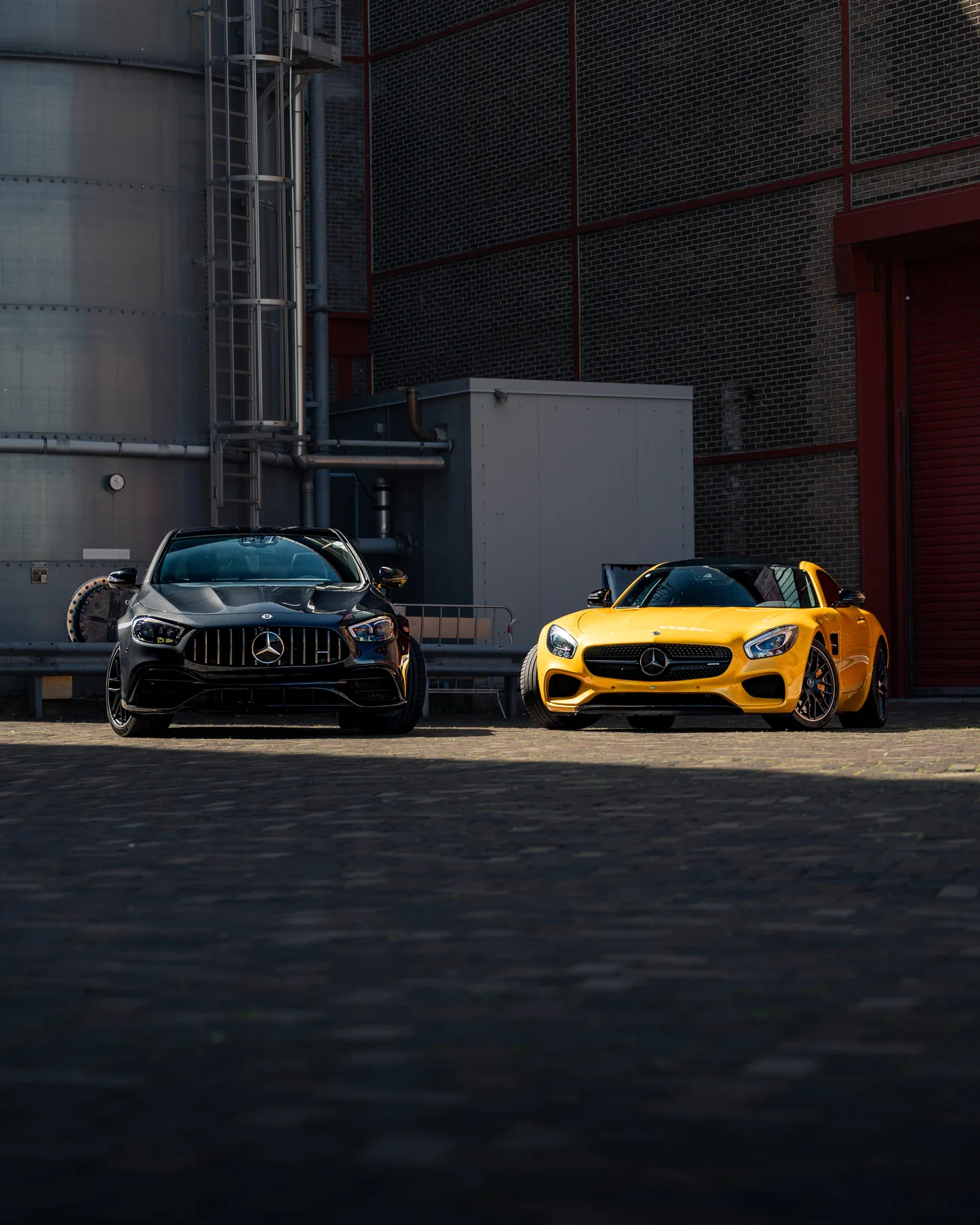 Black and yellow sports cars side by side