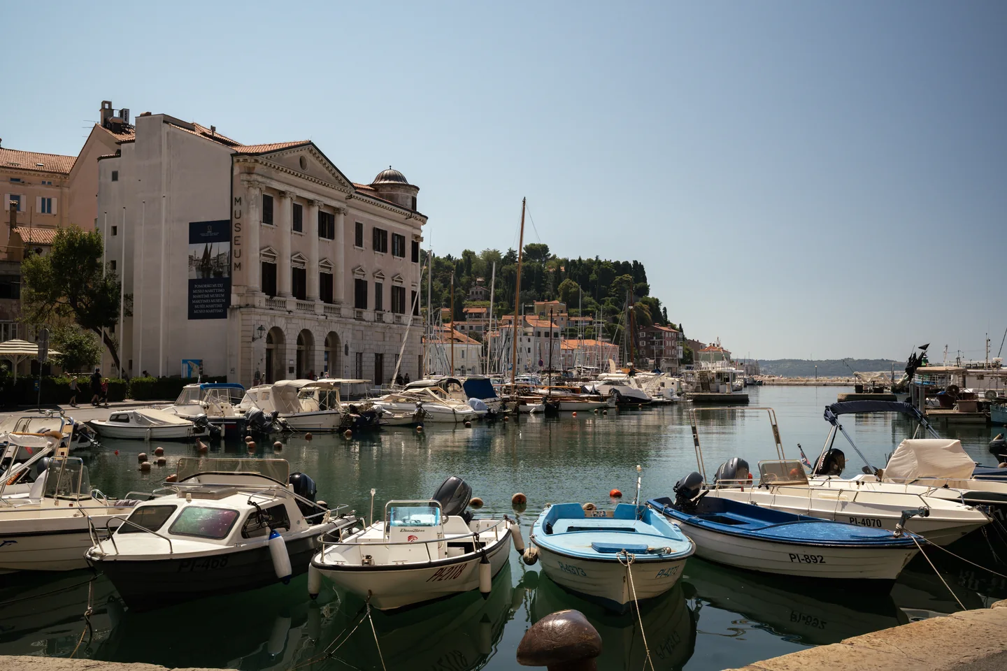 Harbour with small boats and historic buildings